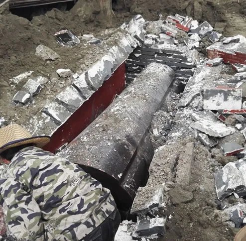 古墓挖出干尸:身体竟百年不腐(图)