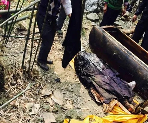 古墓挖出干尸:身体竟百年不腐（图）