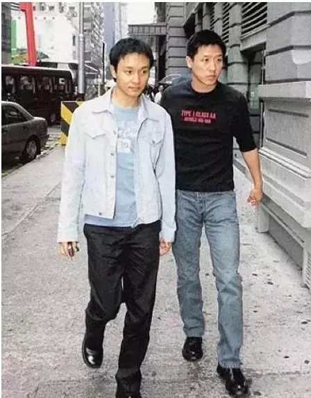 张国荣和唐鹤德是什么关系啊？？？